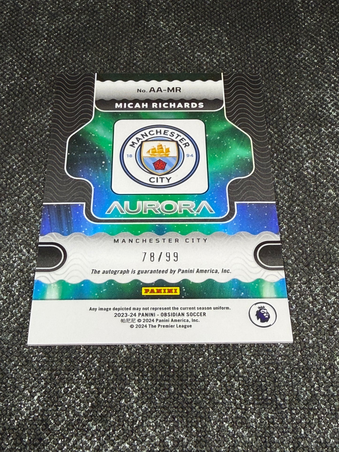 2023-24 Panini Obsidian Soccer Aurora Autographs 78/99 - Micah Richards