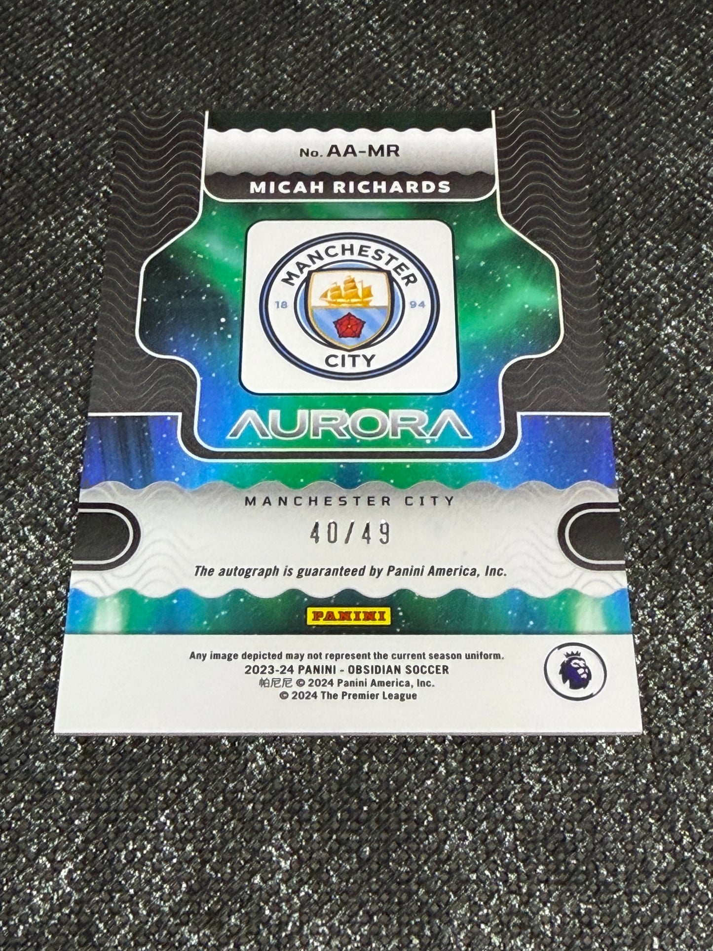 2023-24 Panini Obsidian Soccer Aurora Autographs 40/49 - Micah Richards