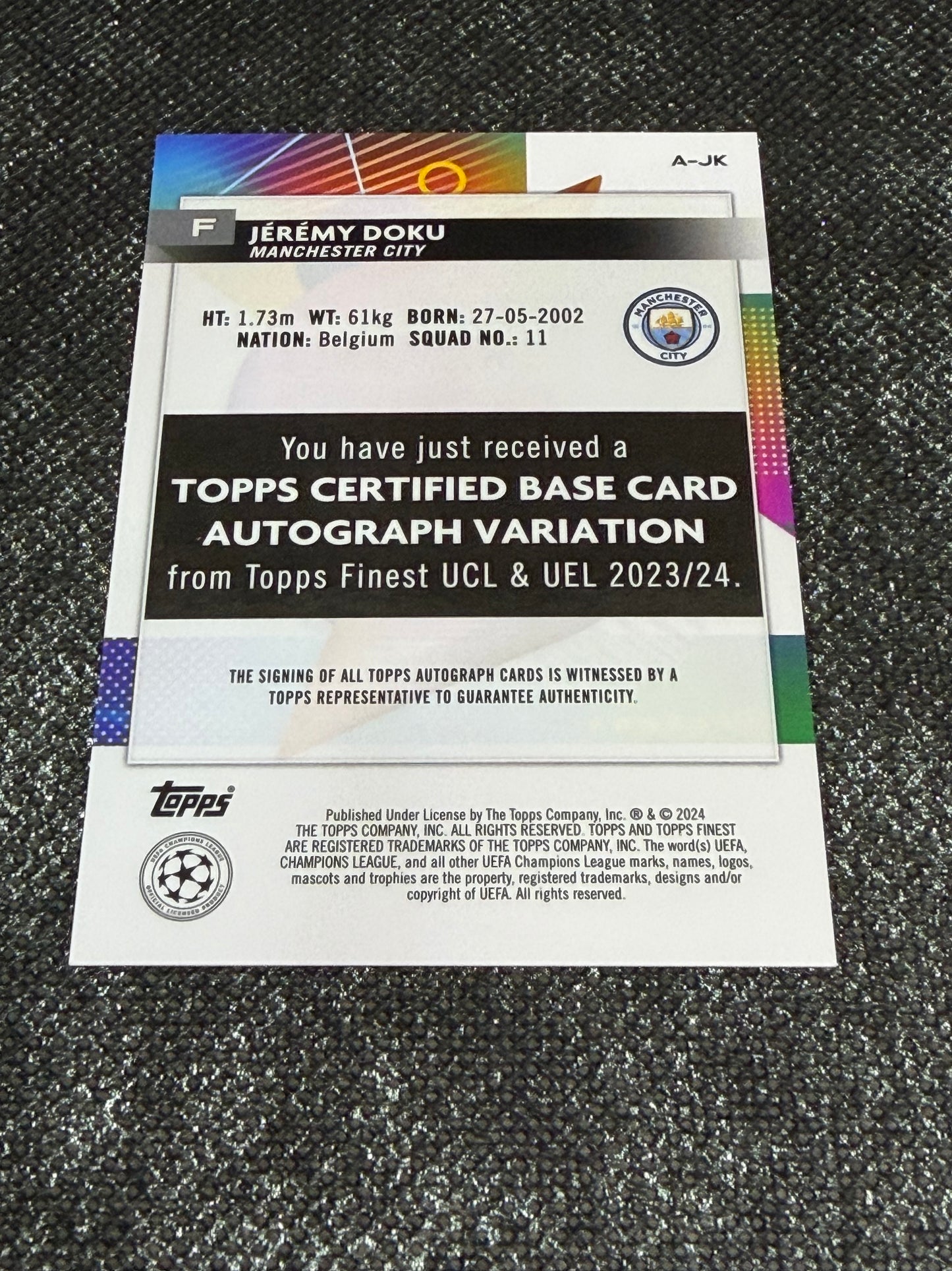 2023-24 Topps Finest UEFA Champions League Base Card Autograph Variation Purple 007/199 - Jeremy Doku
