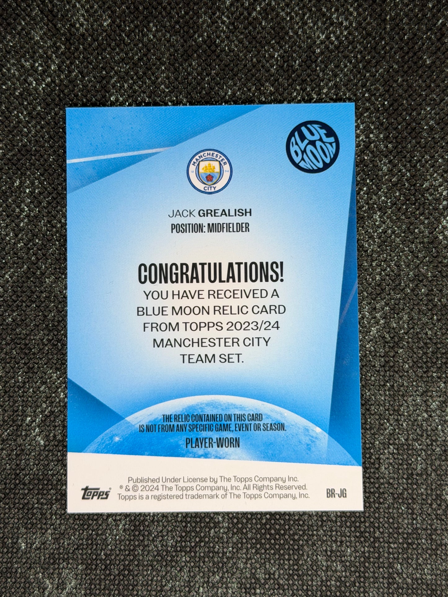 2023-24 Topps Manchester City Team Set Blue Moon Relic Card 08/25 - Jack Grealish