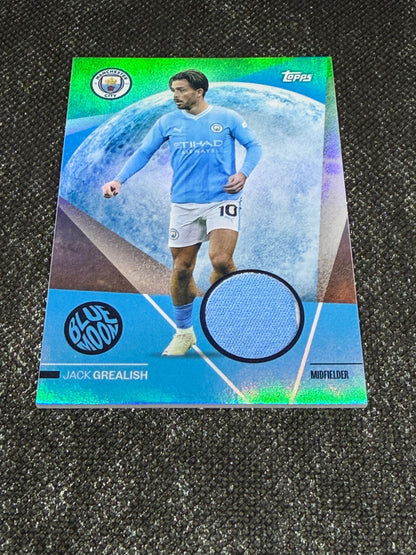 2023-24 Topps Manchester City Team Set Blue Moon Relic Card - Jack Grealish