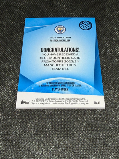 2023-24 Topps Manchester City Team Set Blue Moon Relic Card - Jack Grealish