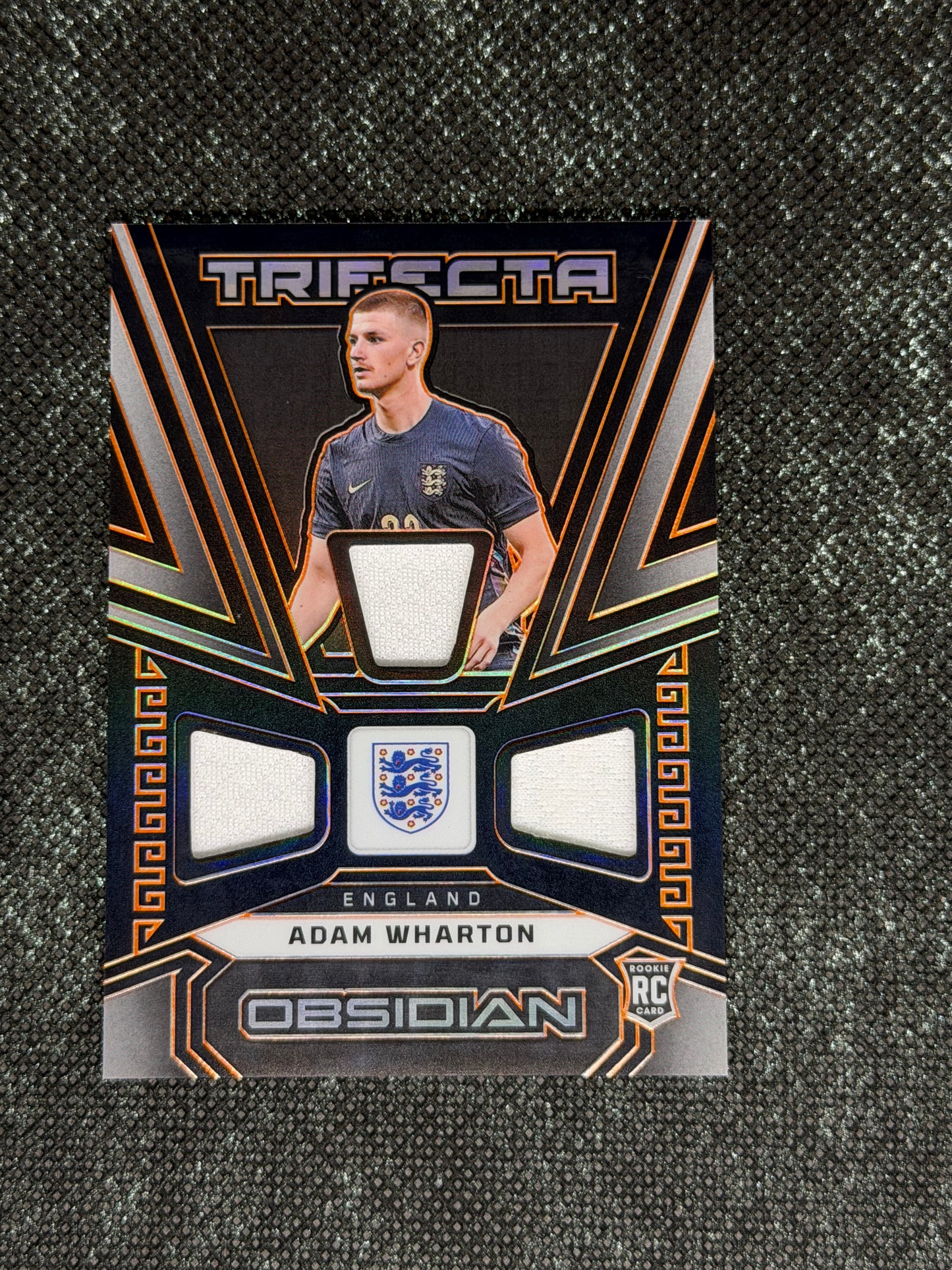 2023-24 Panini Obsidian Soccer Trifecta Material RC 58/99 - Adam Wharton