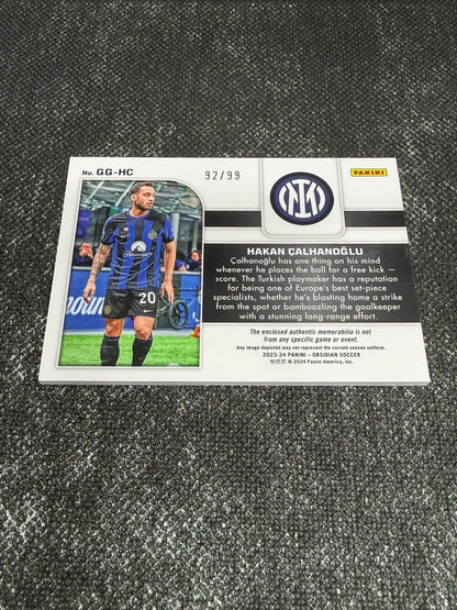 2023-24 Panini Obsidian Soccer Galaxy Gear 92/99 - Hakan Calhanoglu
