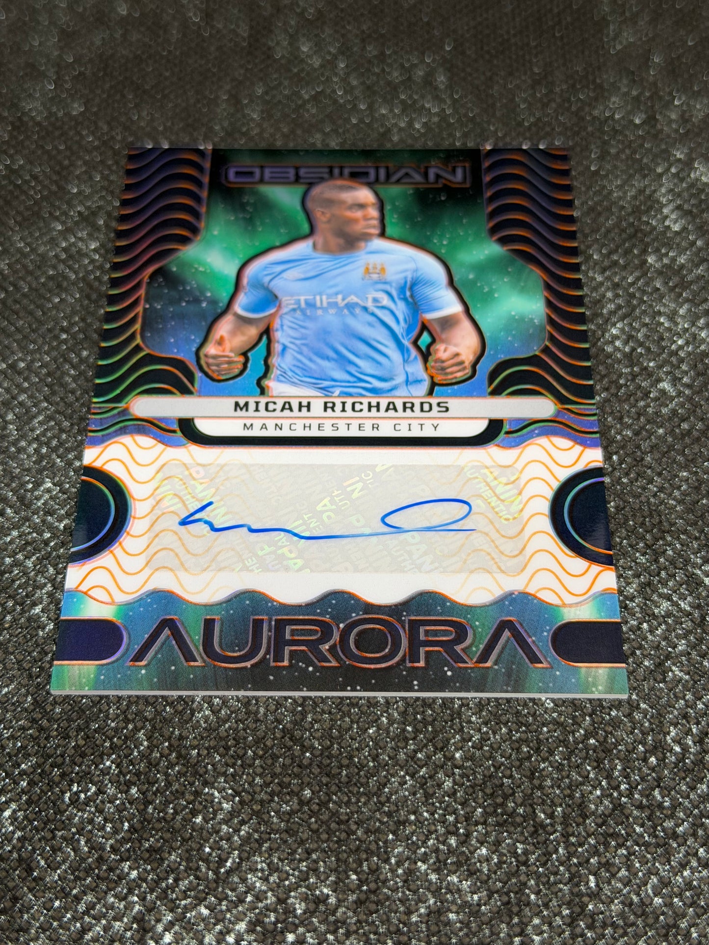 2023-24 Panini Obsidian Soccer Aurora Autographs 78/99 - Micah Richards