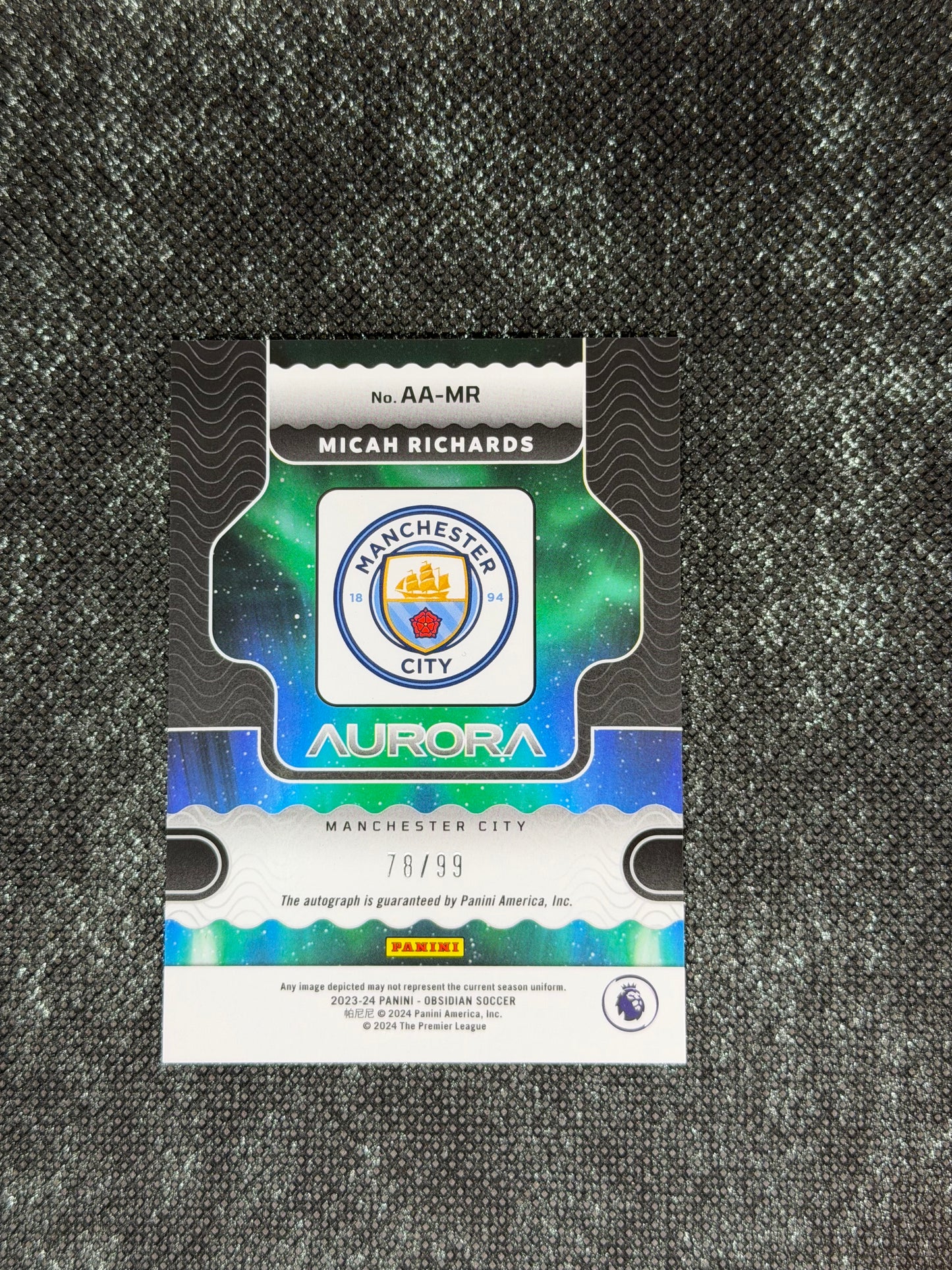 2023-24 Panini Obsidian Soccer Aurora Autographs 78/99 - Micah Richards