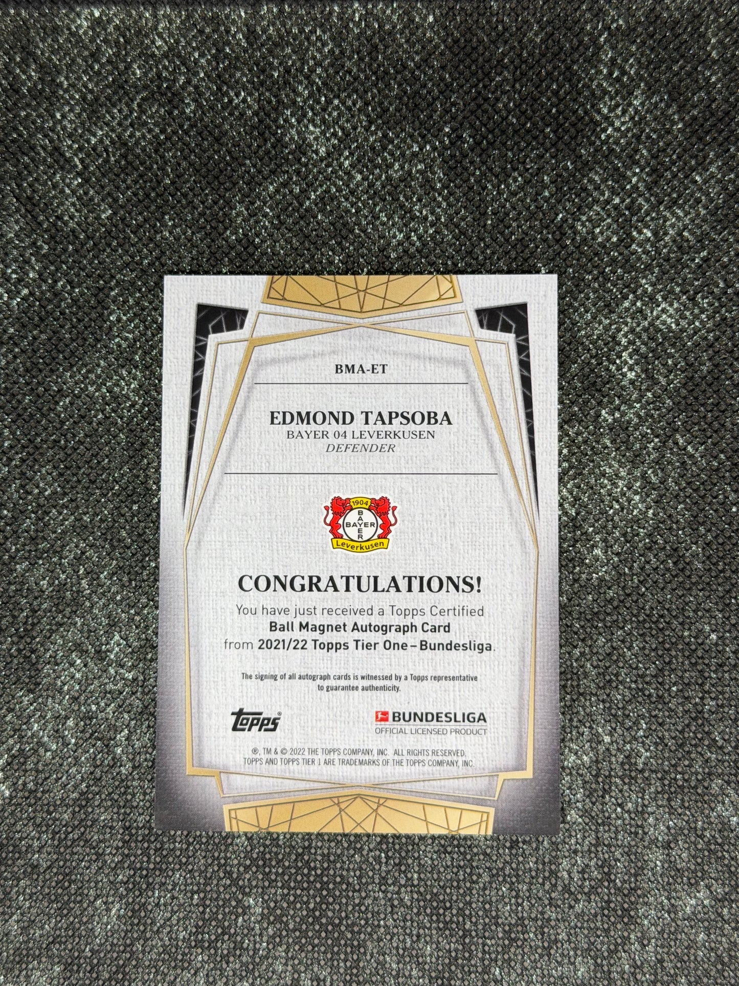 2021-22 Topps Tier One Bundesliga Ball Magnet Autograph Card 070/100 - Edmond Tapsoba