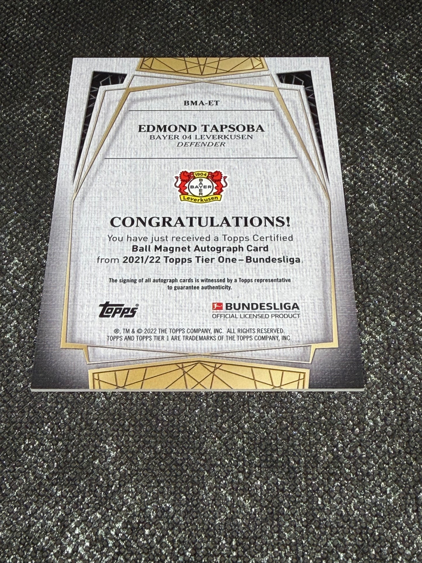 2021-22 Topps Tier One Bundesliga Ball Magnet Autograph Card 070/100 - Edmond Tapsoba