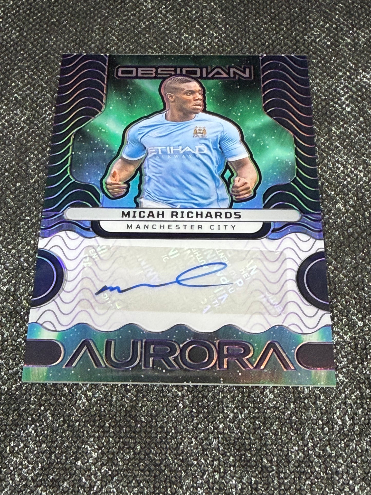 2023-24 Panini Obsidian Soccer Aurora Autographs 40/49 - Micah Richards
