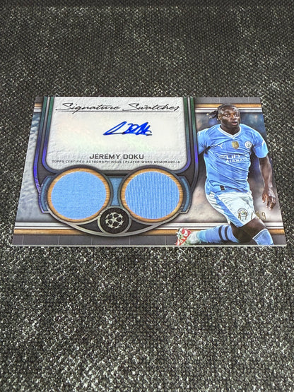 2023-24 Topps Museum Collection UEFA Champions League Autograph Relic Card 47/99 - Jeremy Doku