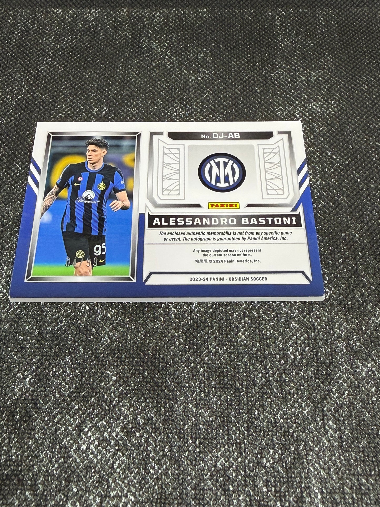 2023-24 Panini Obsidian Soccer Volcanic Dual Jersey Ink 04/99 - Alessandro Bastoni