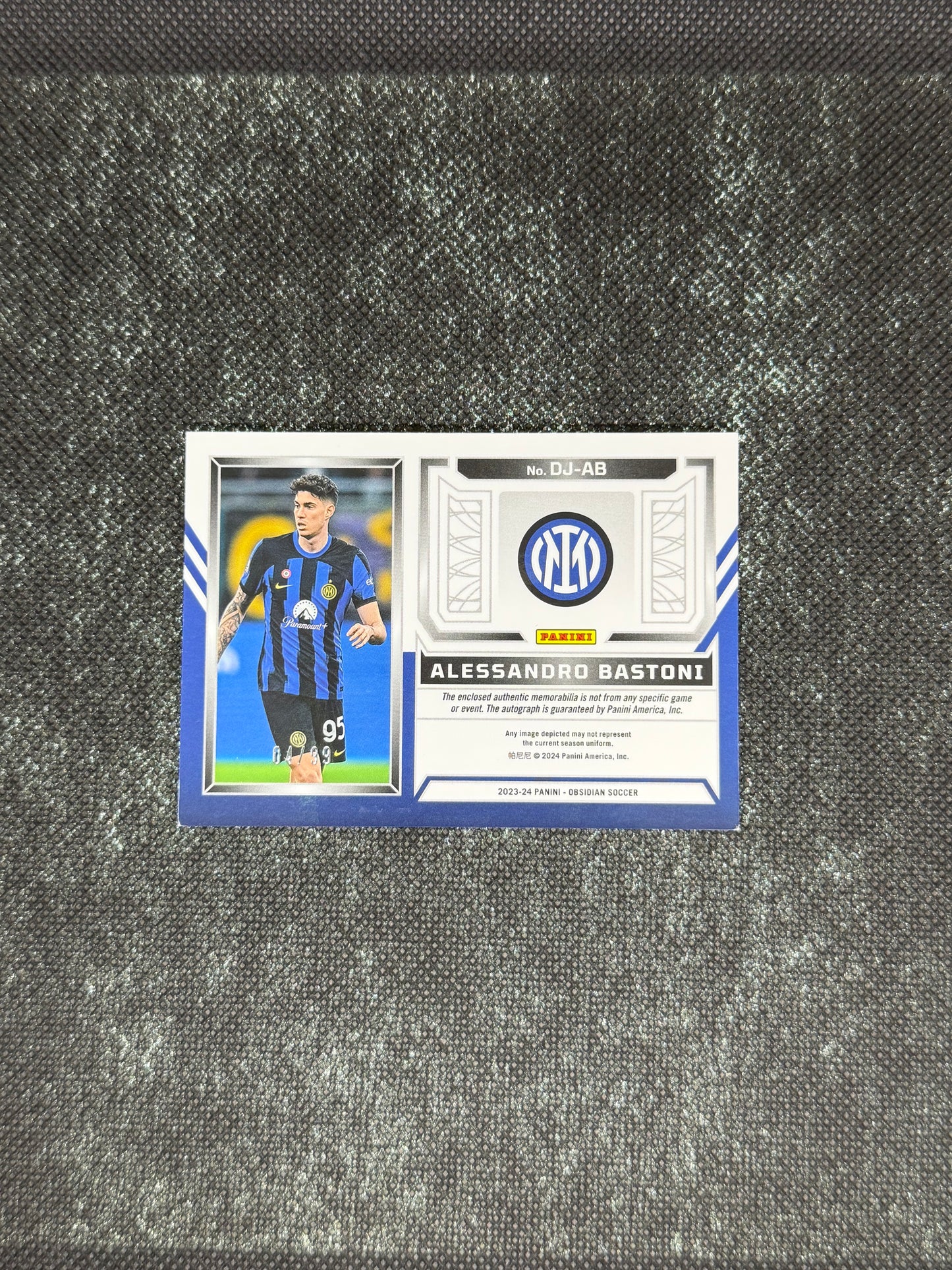 2023-24 Panini Obsidian Soccer Volcanic Dual Jersey Ink 04/99 - Alessandro Bastoni