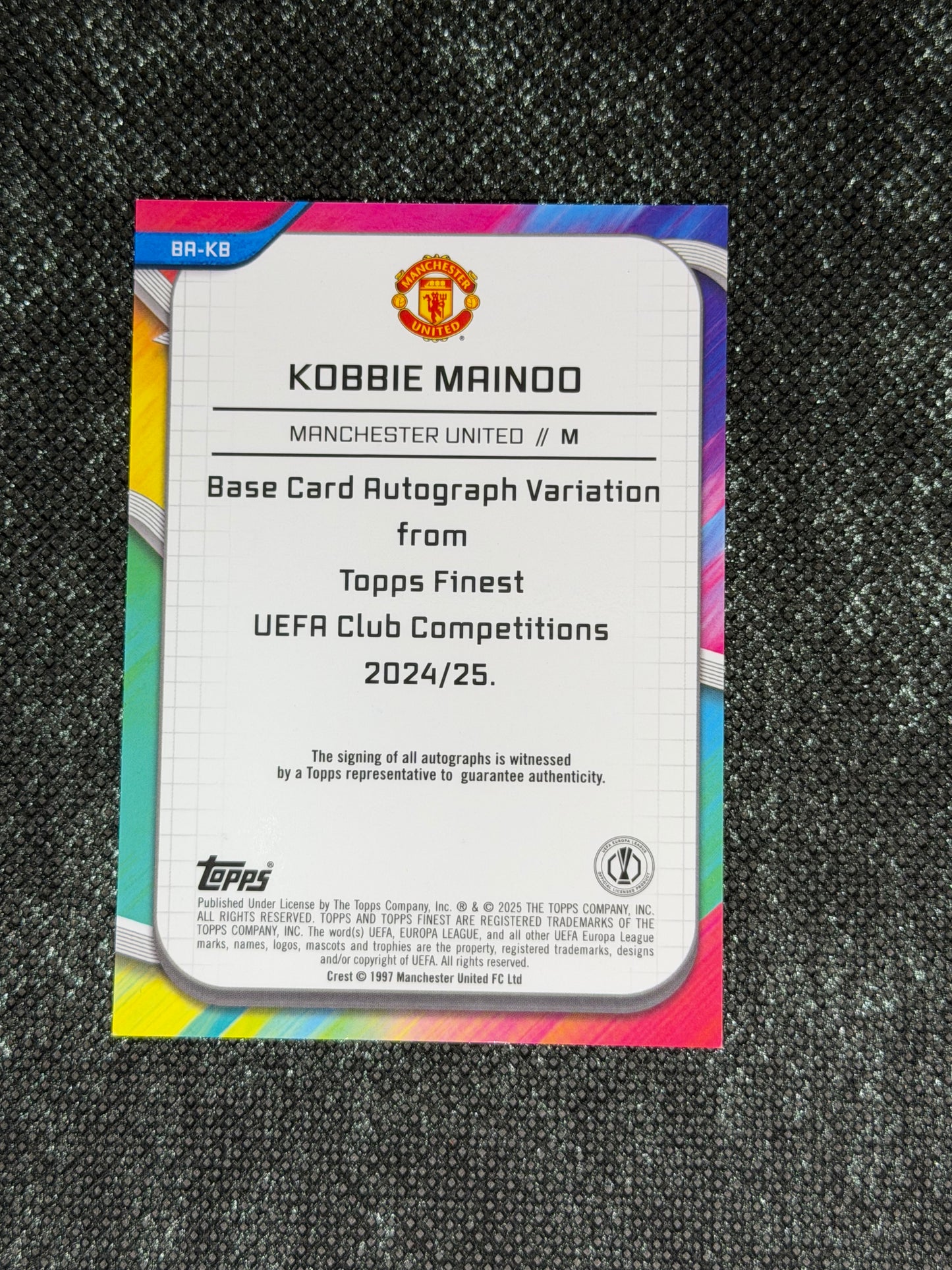 2024-25 Topps Finest UEFA Club Competitions Base Card Autograph Variation Orange Wave 13/25 - Kobbie Mainoo