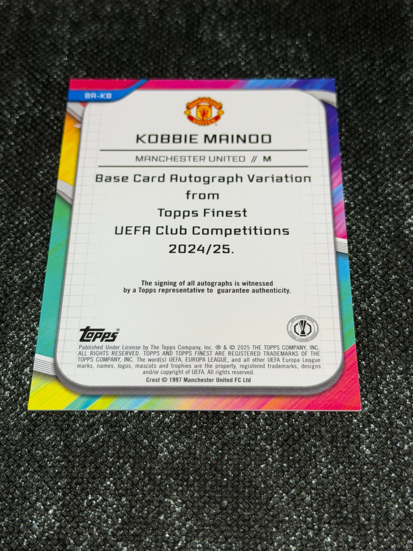 2024-25 Topps Finest UEFA Club Competitions Base Card Autograph Variation Orange Wave 13/25 - Kobbie Mainoo