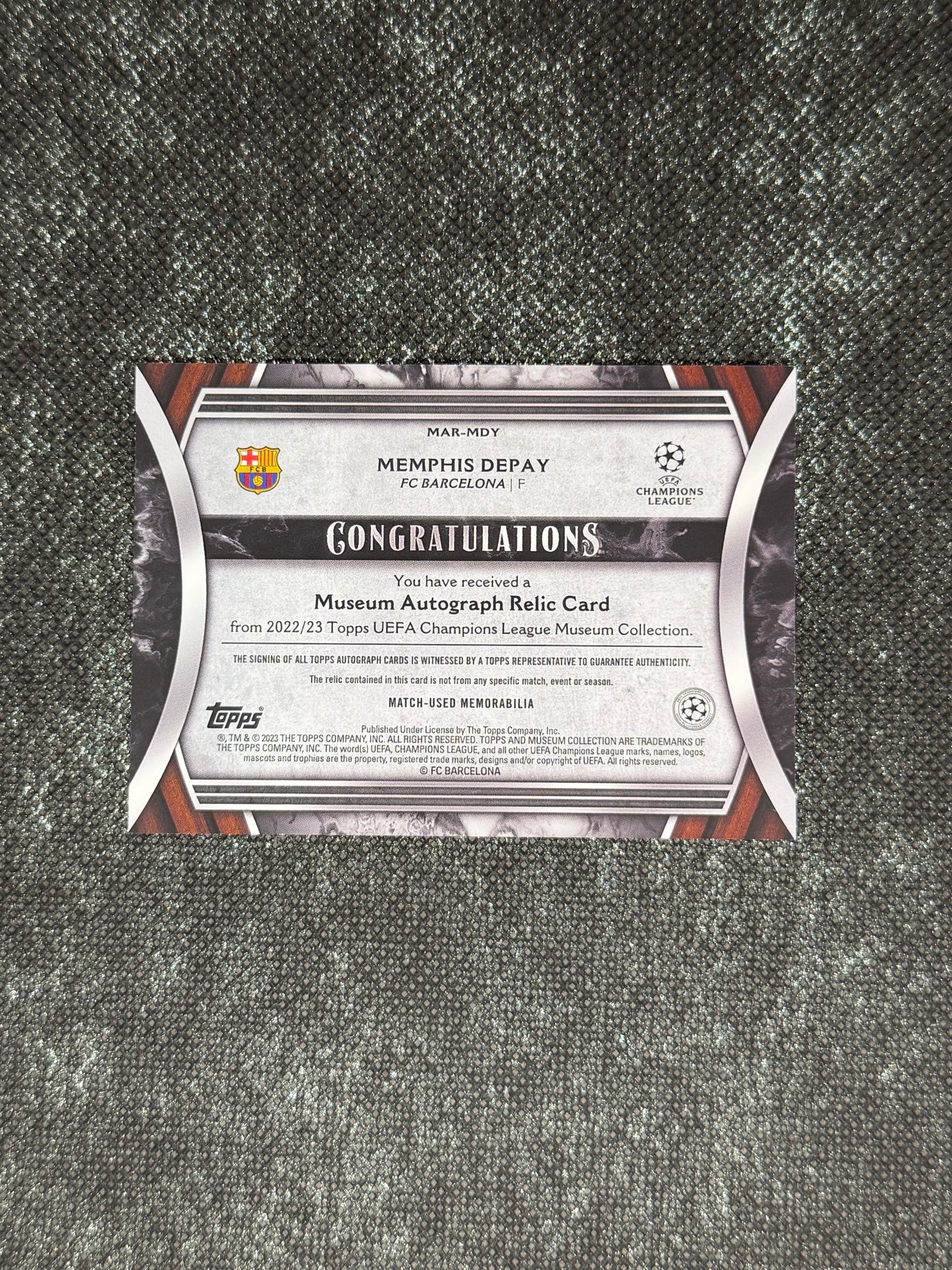 2022-23 Topps Museum Collection UEFA Club Competitions Autograph Relic Card 55/75 - Memphis Depay