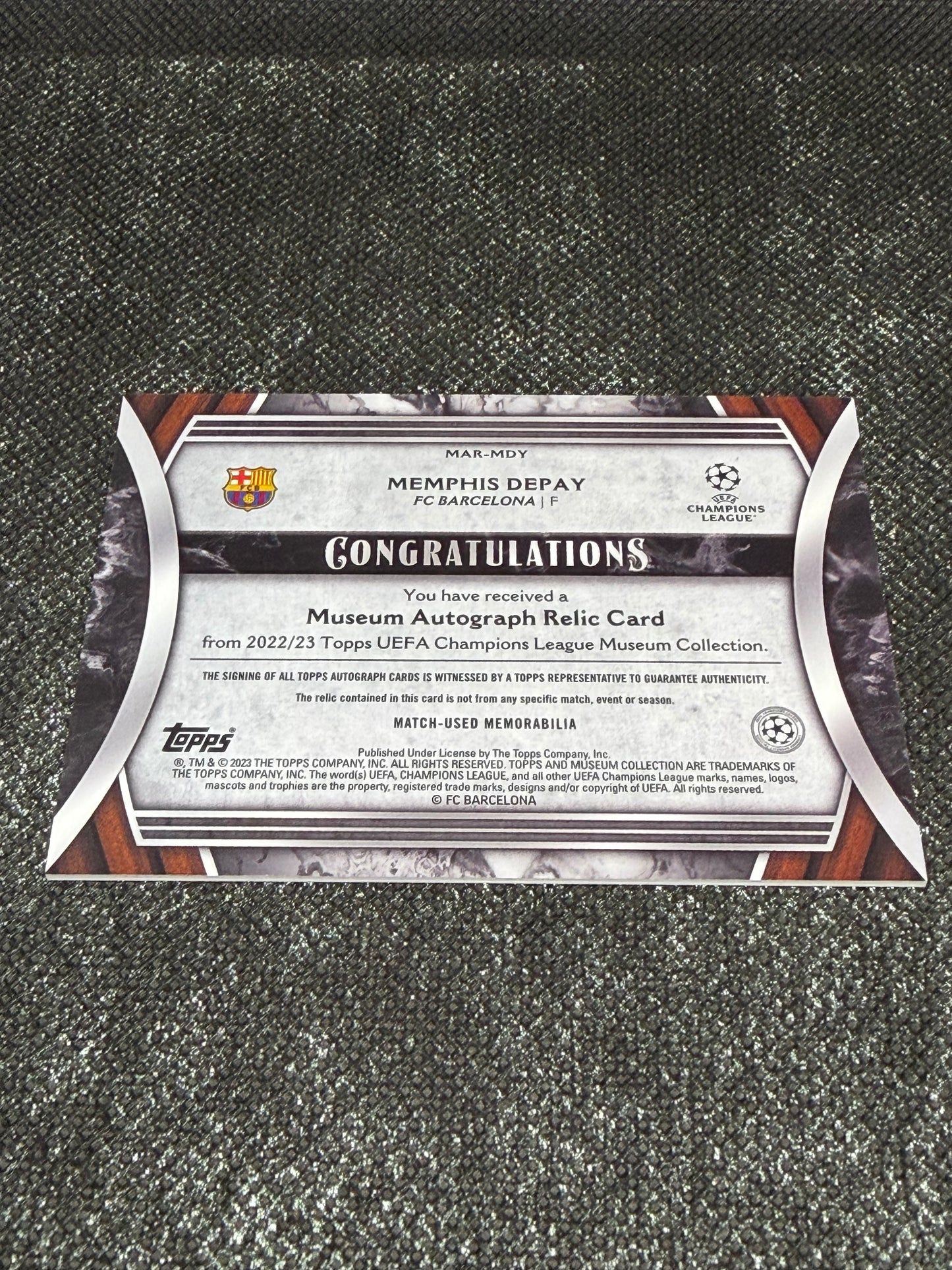2022-23 Topps Museum Collection UEFA Club Competitions Autograph Relic Card 55/75 - Memphis Depay