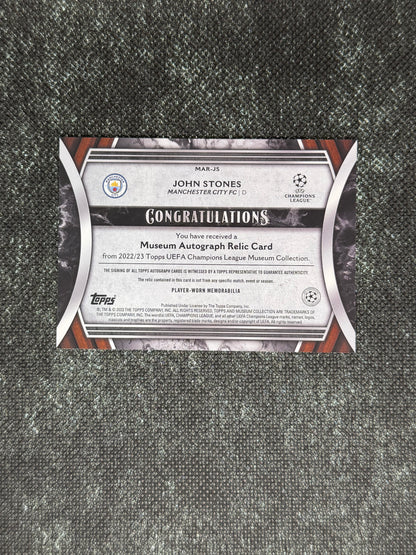2022-23 Topps Museum Collection UEFA Champions League Autograph Relic Card 272/299 - John Stones