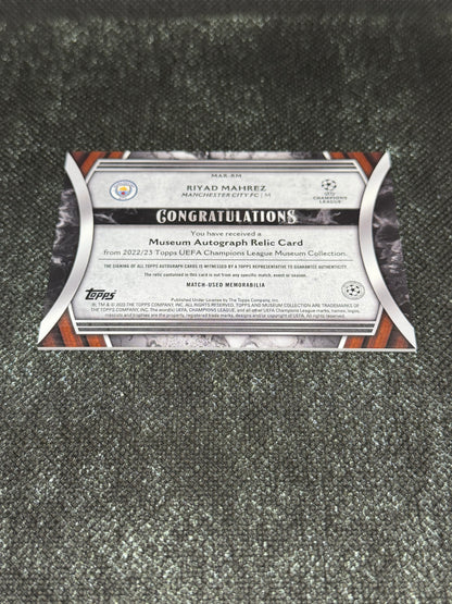 2022-23 Topps Museum Collection UEFA Champions League Autograph Relic Card 262/299 - Riyad Mahrez