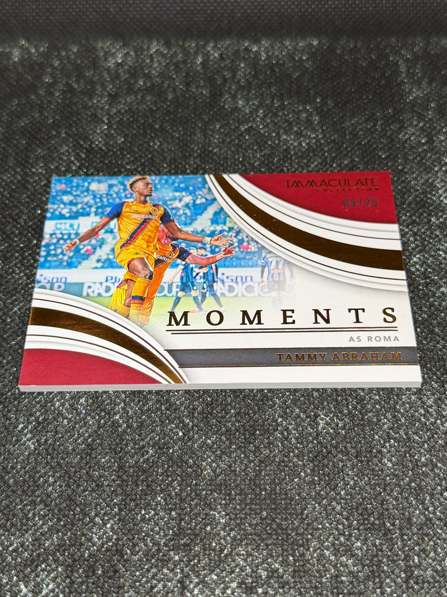 2023-23 Panini - Immaculate Collection Soccer Moments Insert (SSP) 09/25 - Tammy Abraham AS Roma