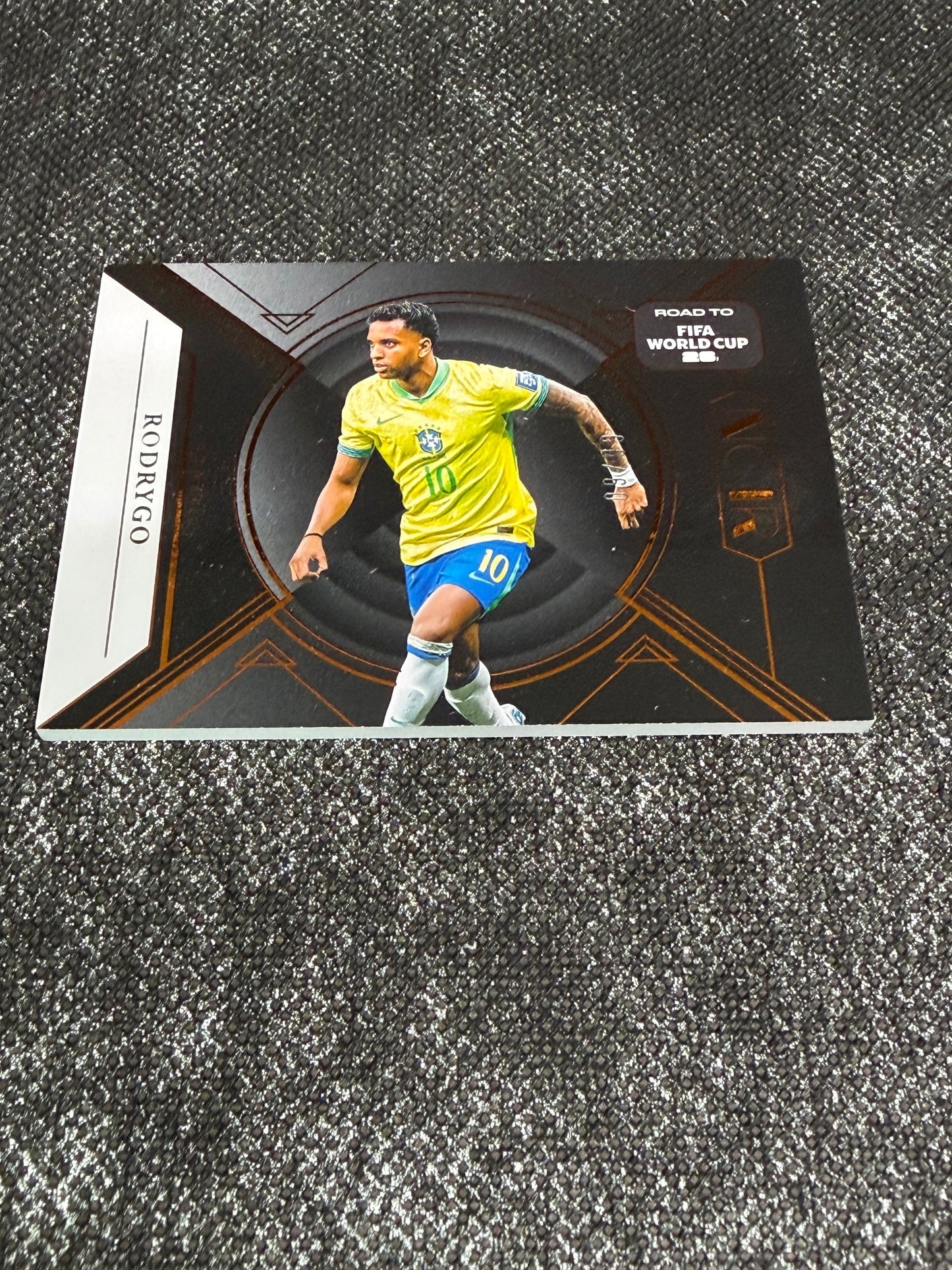 2025-26 Panini Noir Road To FIFA World Cup 26 Soccer Bronze 09/99 - Rodrygo