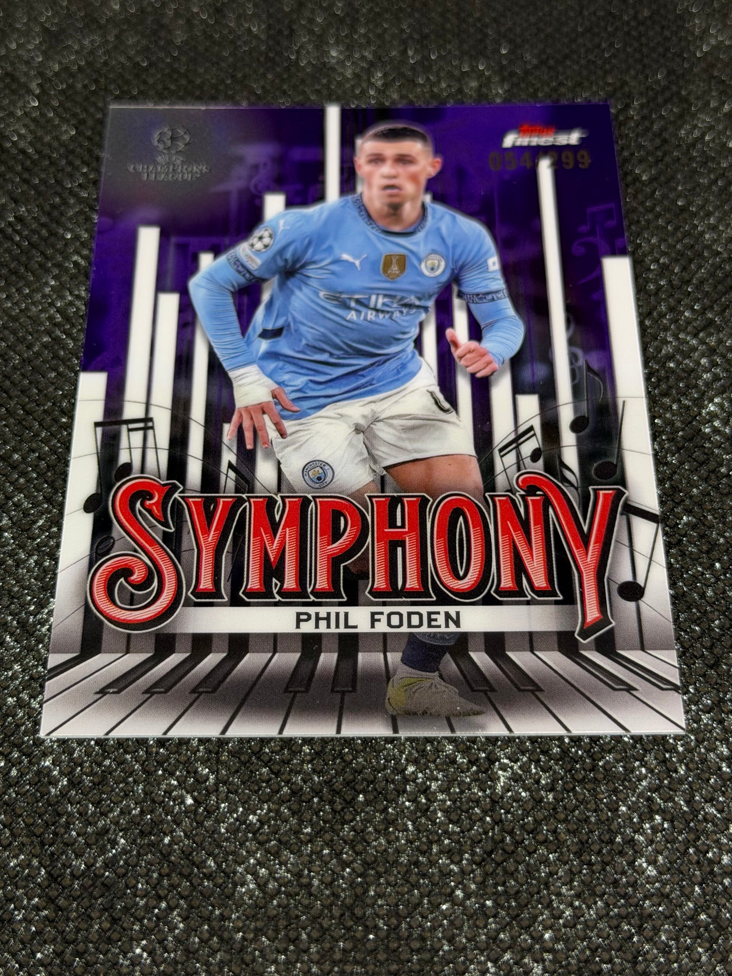 2024-25 Topps Finest UCC Finest Symphony Insert Purple Refractor 054/299 - Phil Foden